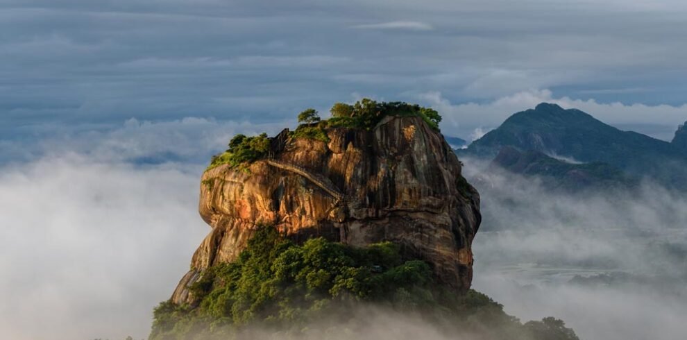 Sigiriya day tour with Sri Lanka Drivers and Guides, featuring Lion Rock, frescoes, and Dambulla Cave Temple.